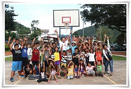 Being a basketball coach, Eden Charity Ambassador Alex Niu accompany children when they were after class